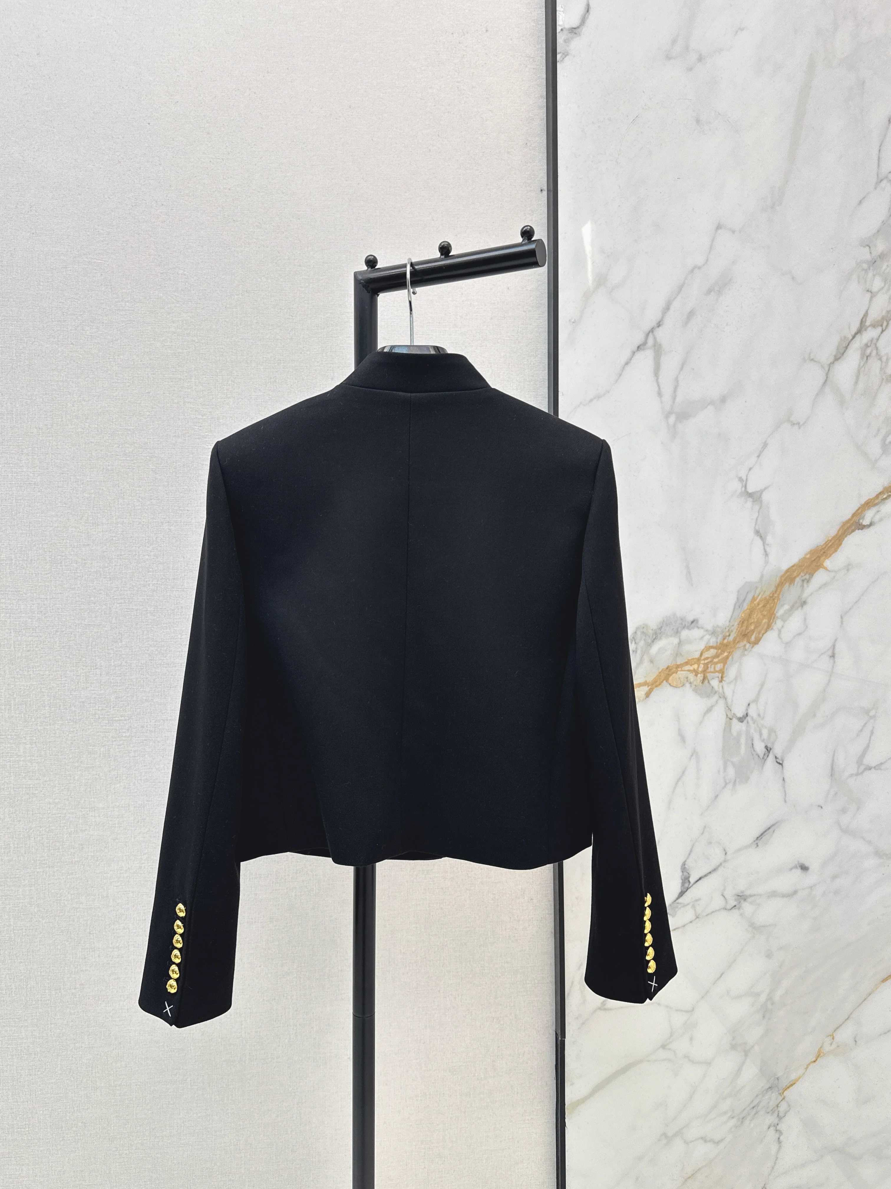 Gold-buttoned jacket