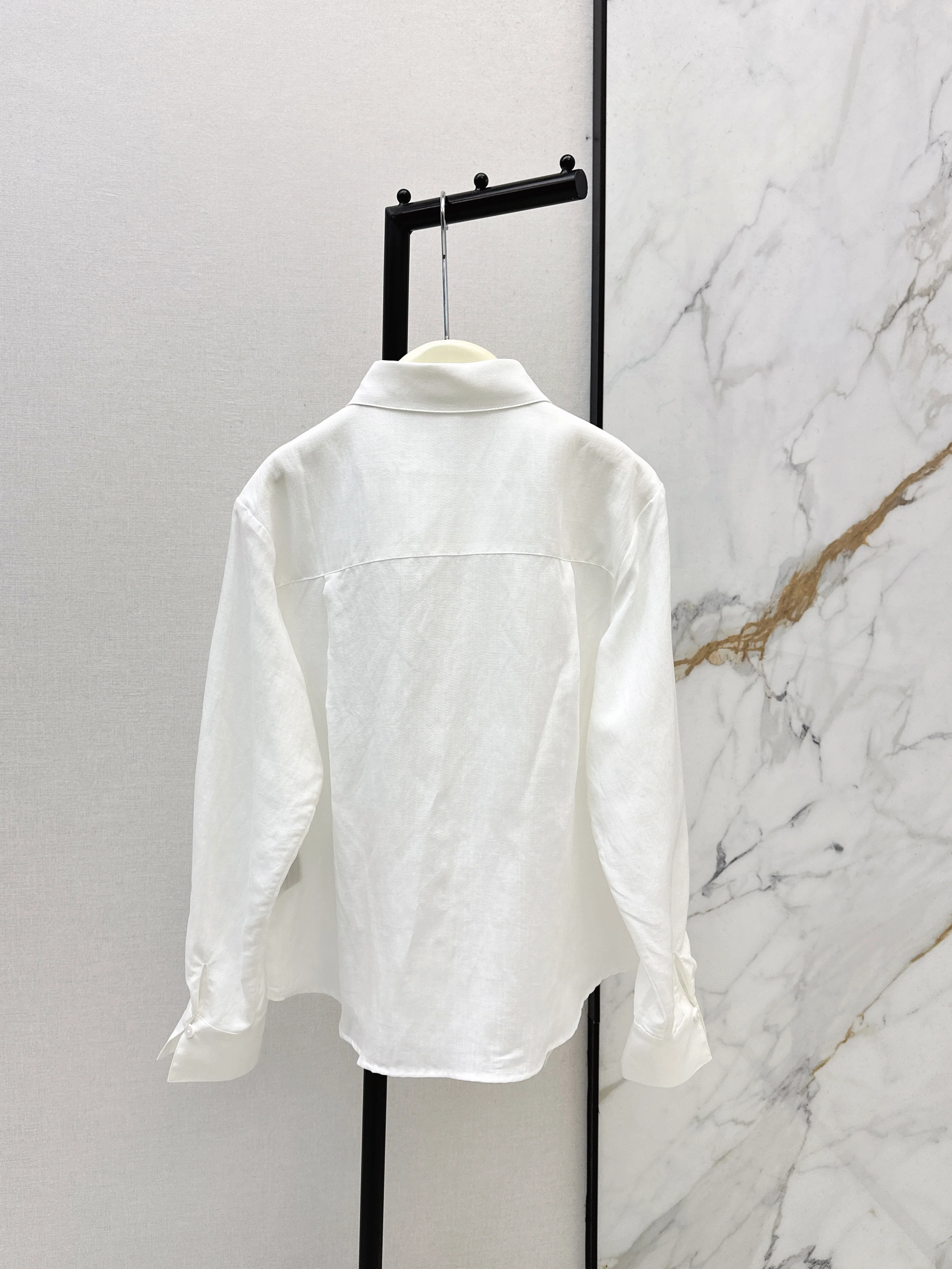 White shirt with ruffled trim