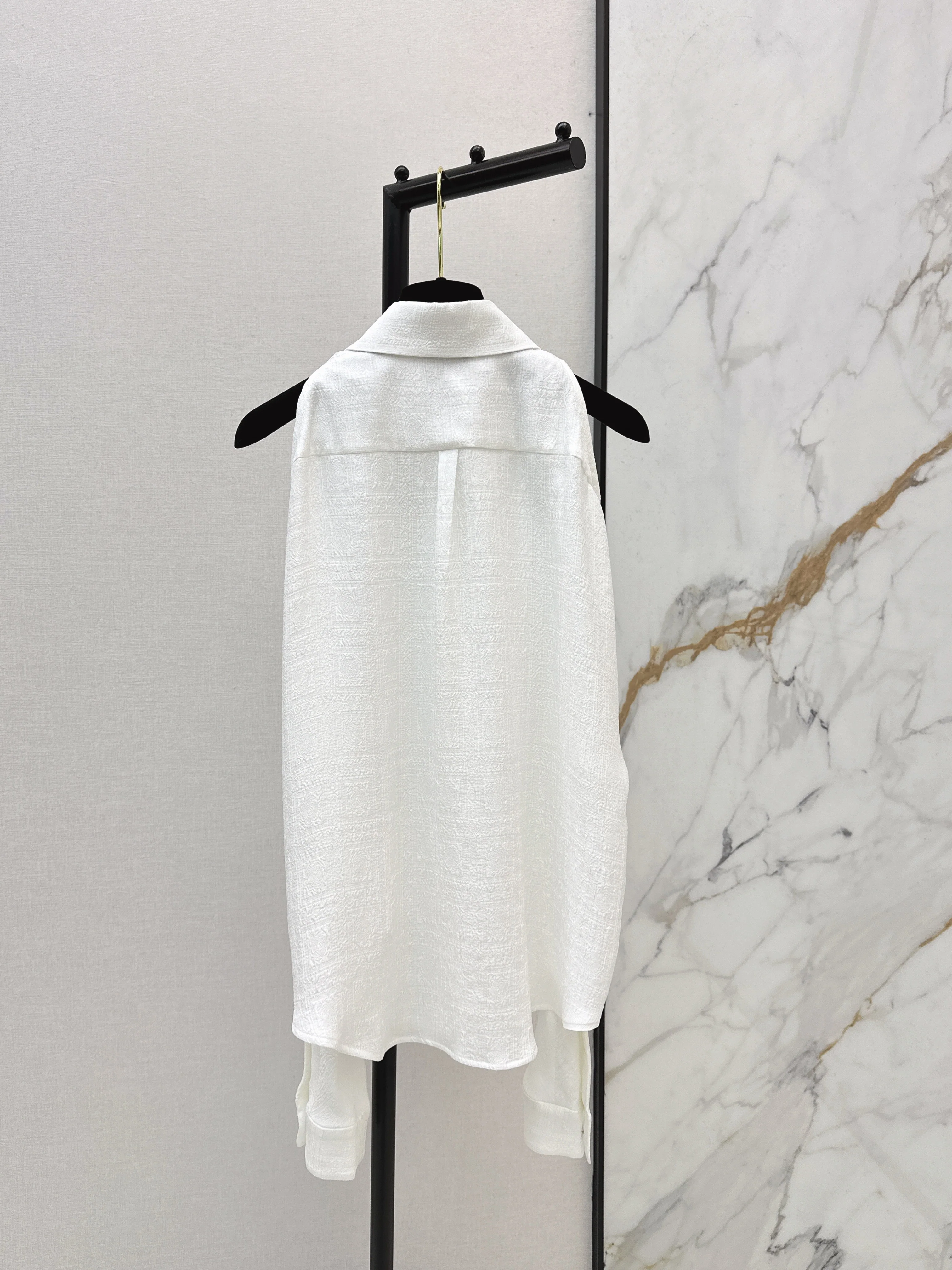 Off-the-shoulder silk blouse