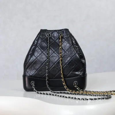 Chanel Black / Blue / White / Pink / Milk tea color Quilted Leather Backpacks