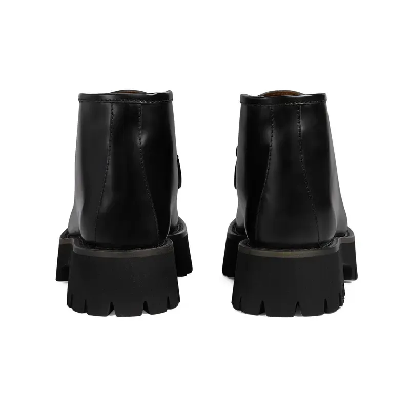 Gucci black horse collar ankle boots