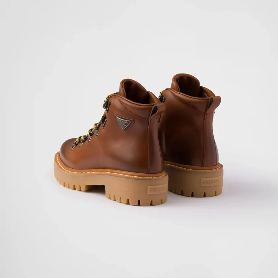 PRADA Lace-up ankle boots in cognac leather