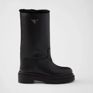PRADA Black leather and sheepskin boots