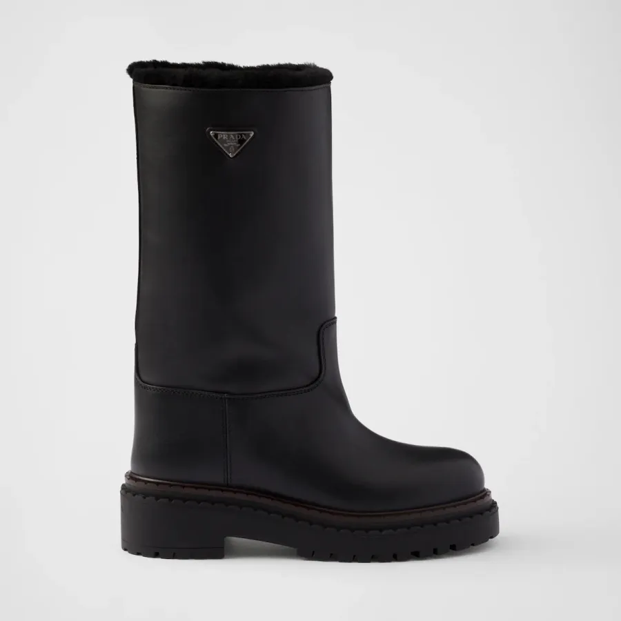 PRADA Black leather and sheepskin boots