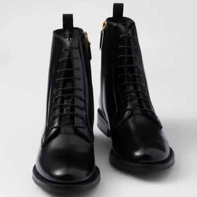 PRADA Black shiny leather ankle boots