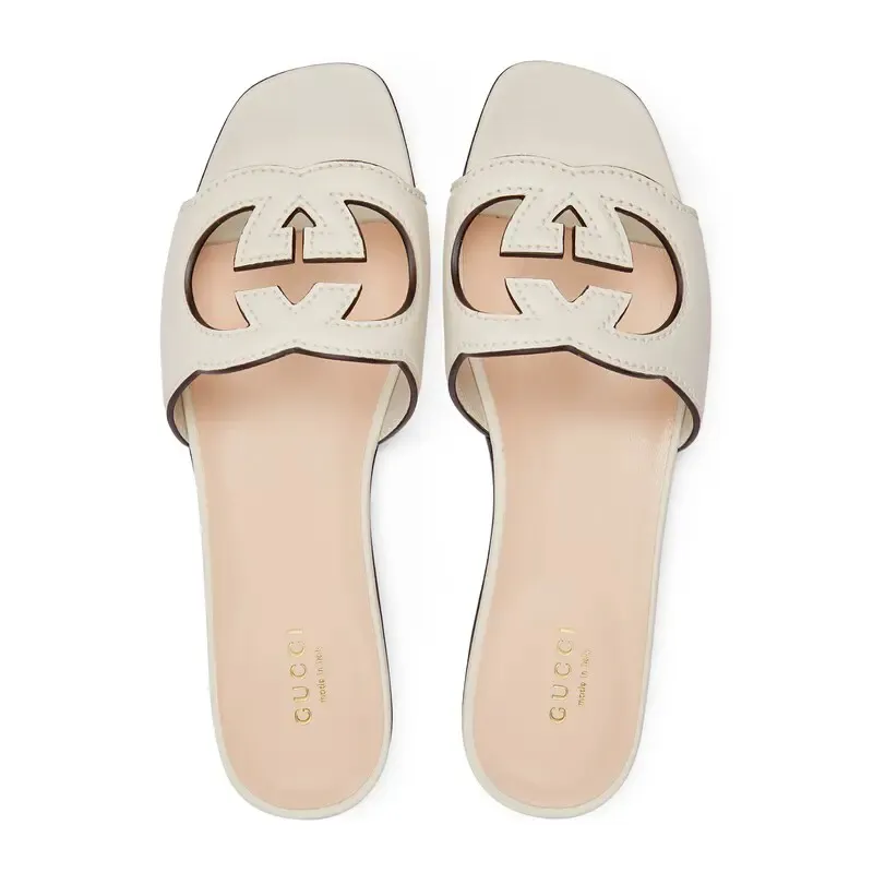 Gucci white flat bottom slippers