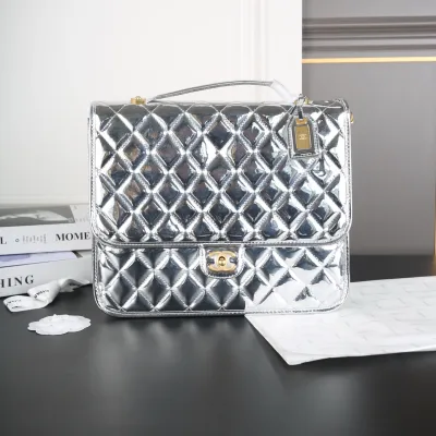 Chanel Silver / Gold / Black  patent leather Backpacks