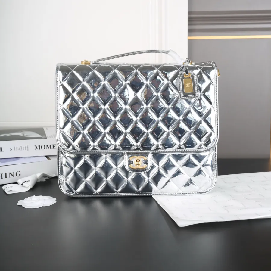 Chanel Silver / Gold / Black  patent leather Backpacks