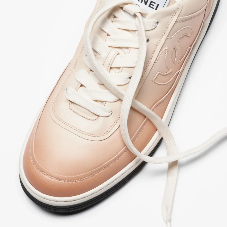 Calfskin with light orange print Chanel Sneakers
