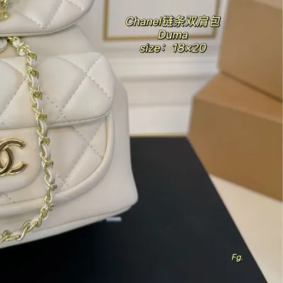 Chanel Pink / Yellow / White / Black Quilted Lambskin Leather Backpacks