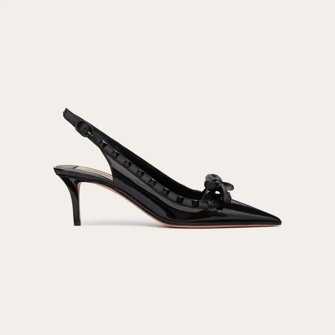 VALENTINO Lace-up heels in patent leather with rivet bow in the same color (heel height: 6cm)