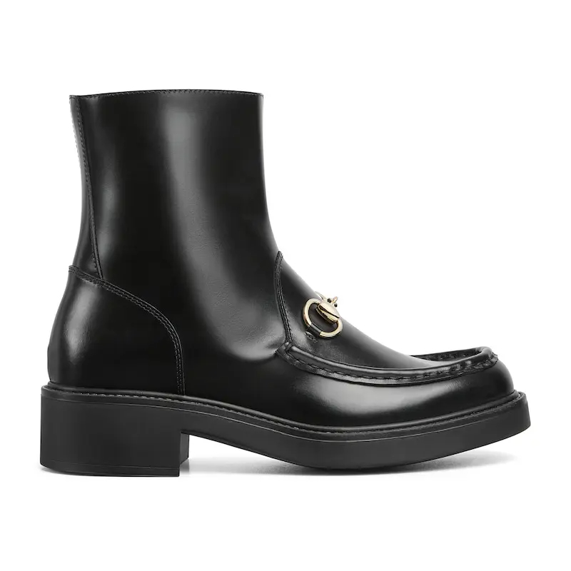 Botas de tornozelo pretas Gucci.