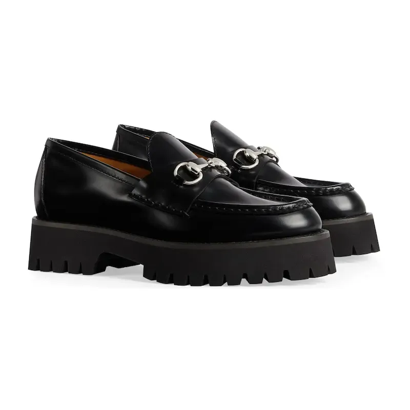 Gucci black thick soled loafers