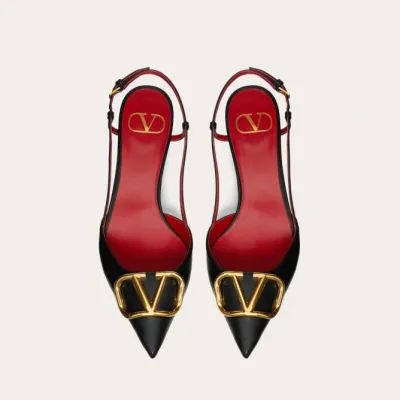 VALENTINO Lace-up heels with decorative patent leather