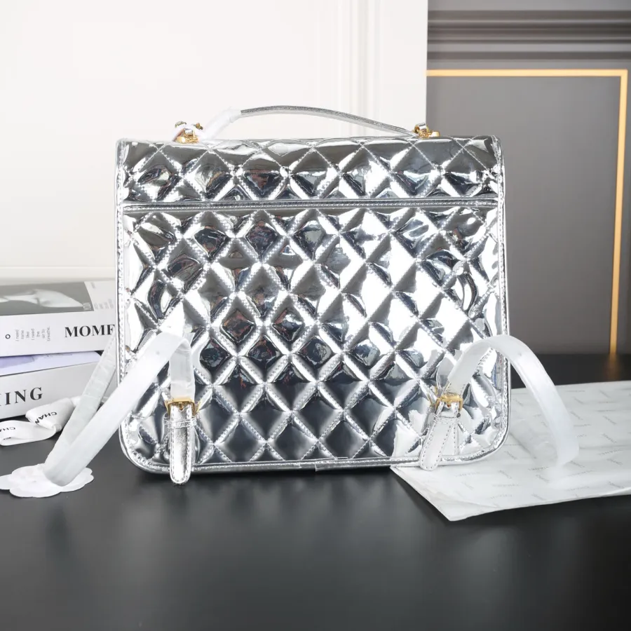 Chanel Silver / Gold / Black  patent leather Backpacks