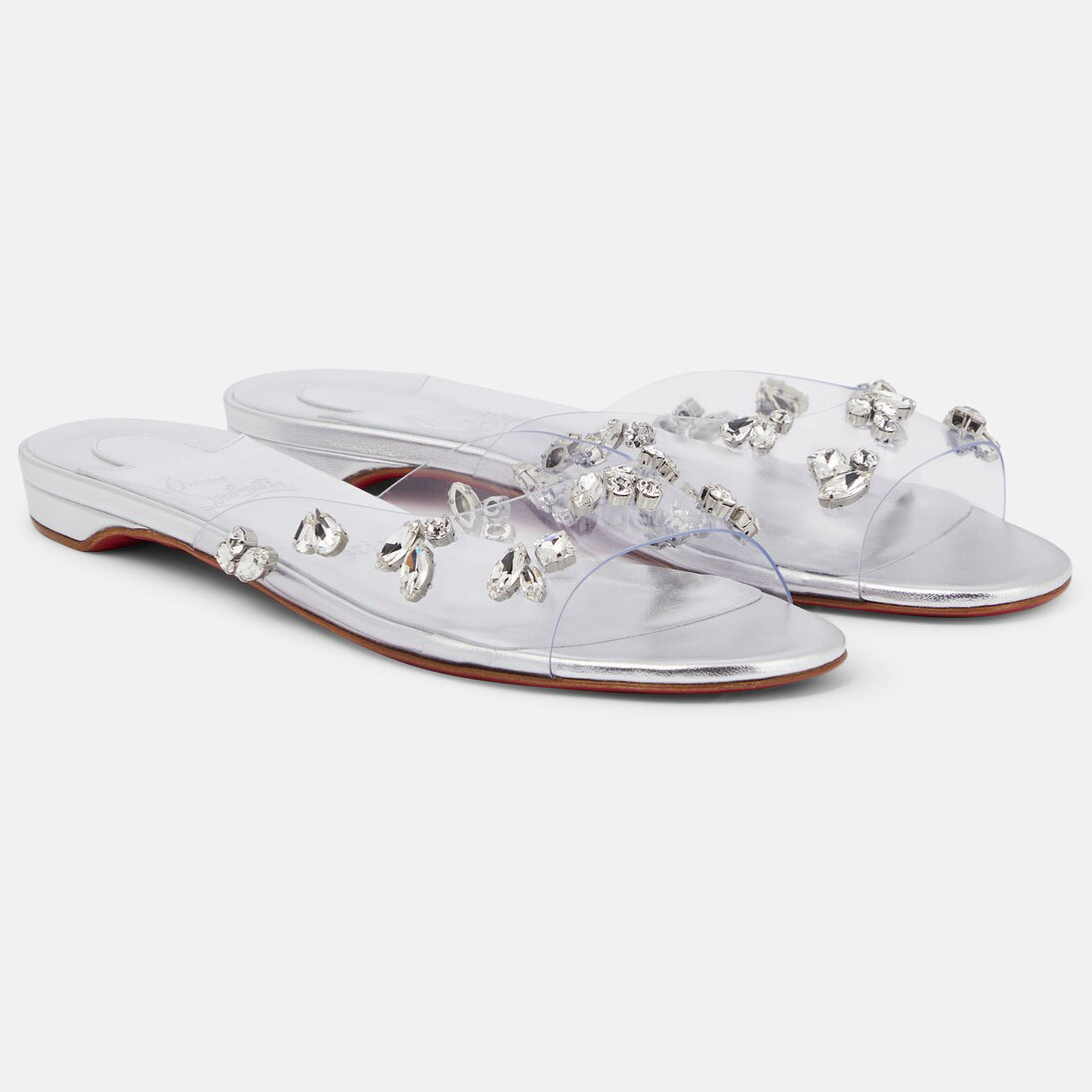 Christian Louboutin chinelos planos transparentes prateados com faixa