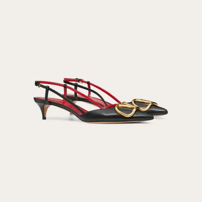 VALENTINO Lace-up heels with decorative patent leather