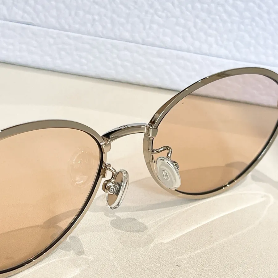 DIOR oval frame glasses silver tawny color Size 55口18-140