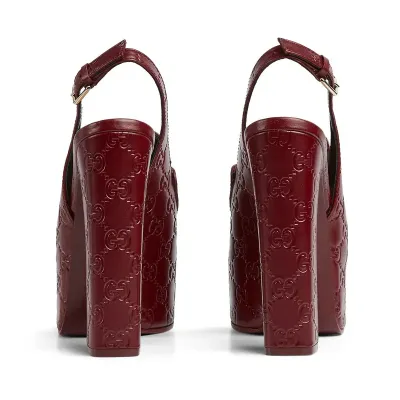 Gucci red thick soled rear lace up high heels