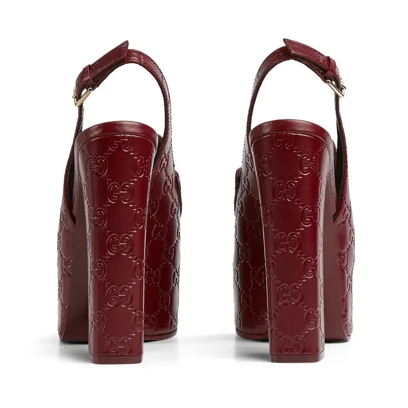 Gucci red thick soled rear lace up high heels