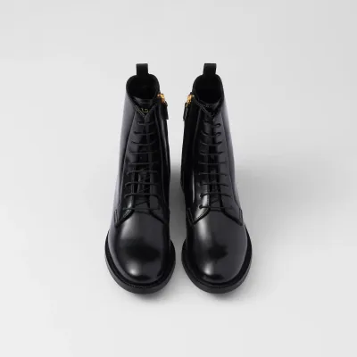 PRADA Black shiny leather ankle boots