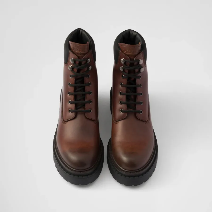 PRADA Dark brown leather and recycled nylon ankle boots