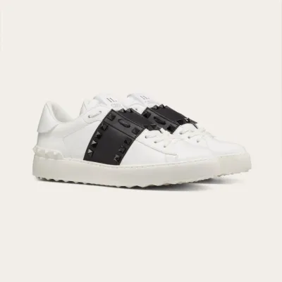 VALENTINO Women's studded calf leather sneakers in the same color
