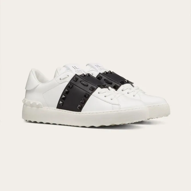 VALENTINO Women's studded calf leather sneakers in the same color