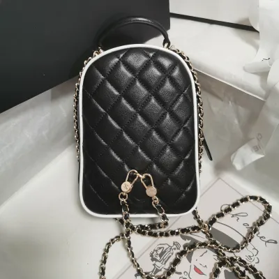 Chanel Black / White Quilted  Lambskin Leather