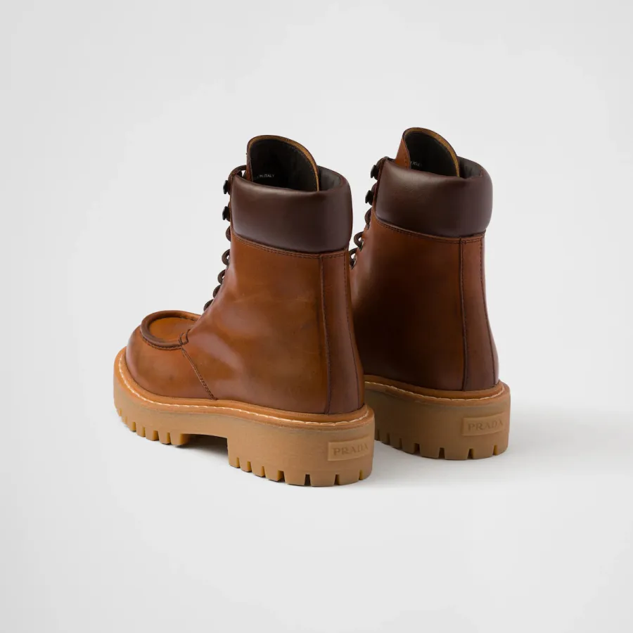 PRADA Lace-up ankle boots in cognac leather