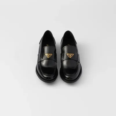 PRADA Black shiny leather loafers