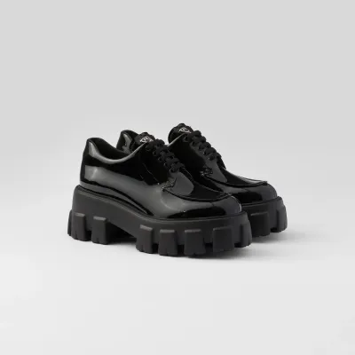 PRADA Black Monolith lacquered leather lace-up shoes