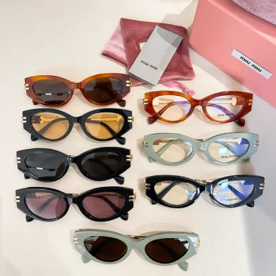 Miu Miu Cat Eye glasses chocolate brown/transparent chocolate/black gold/black tawny/green/green brown/black red/transparent black color Size 52口18-140