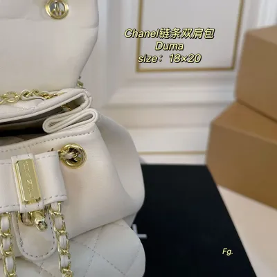 Chanel Pink / Yellow / White / Black Quilted Lambskin Leather Backpacks