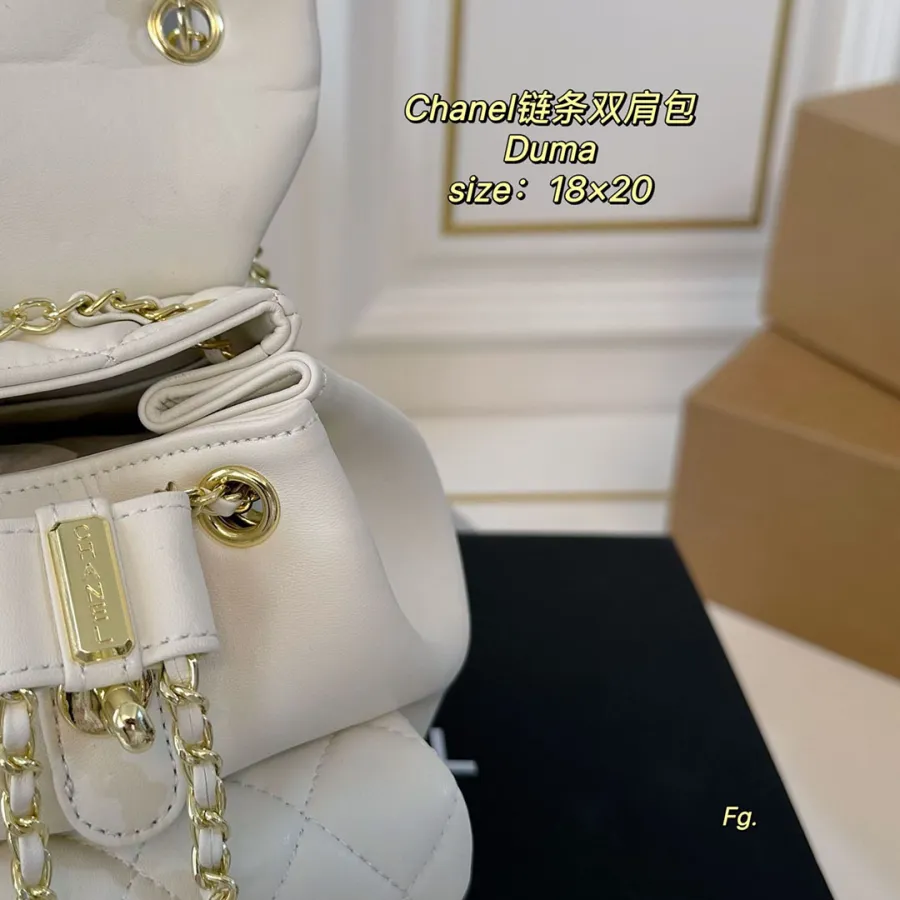 Chanel Pink / Yellow / White / Black Quilted Lambskin Leather Backpacks