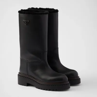 PRADA Black leather and sheepskin boots