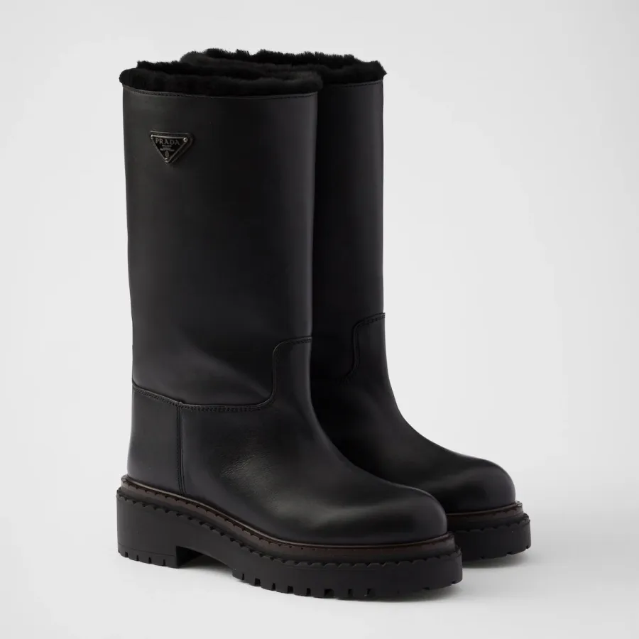 PRADA Black leather and sheepskin boots