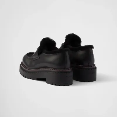PRADA Black double fabric Chocolate leather and sheep fur loafers