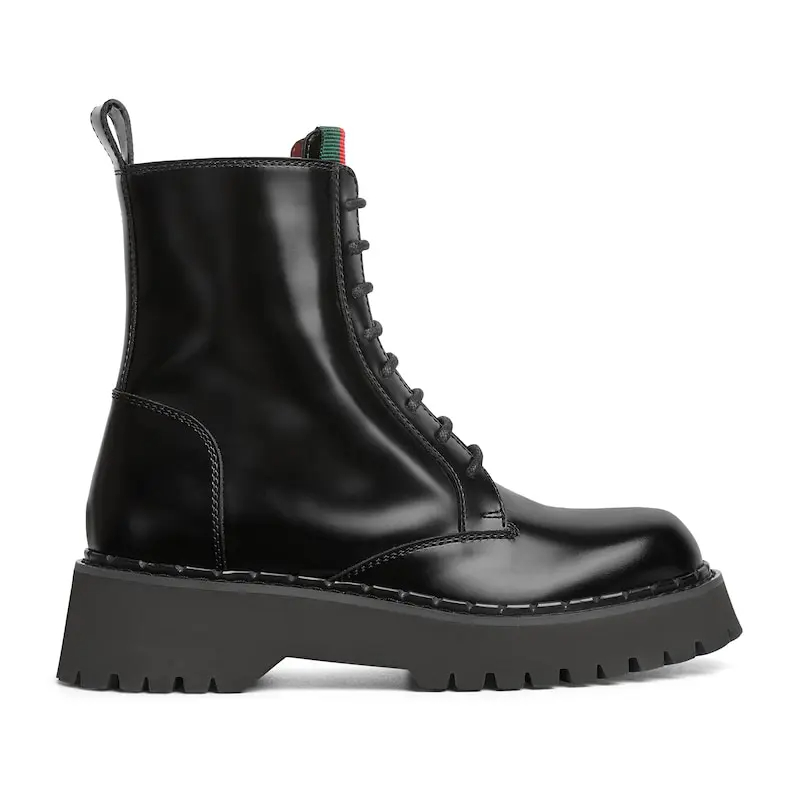 Gucci botas curtas de tecido preto entrelaçado.