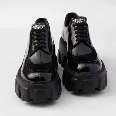 PRADA Black Monolith lacquered leather lace-up shoes
