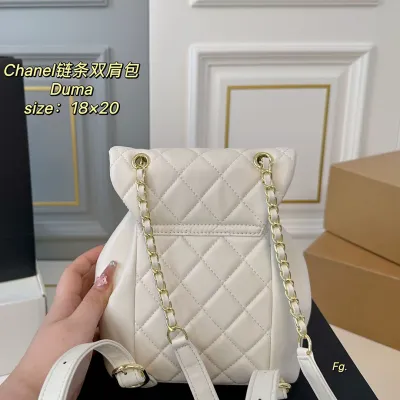 Chanel Pink / Yellow / White / Black Quilted Lambskin Leather Backpacks