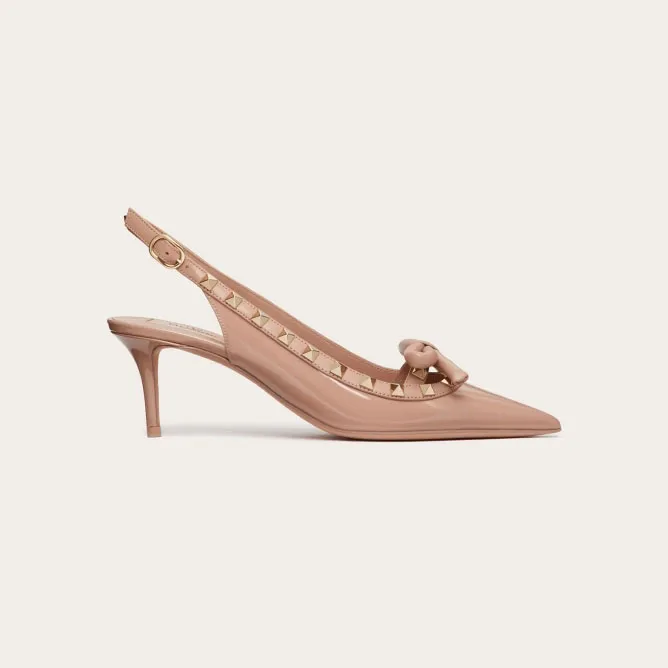 VALENTINO Lace-up heels in patent leather with rivet bow in the same color (heel height: 6cm)