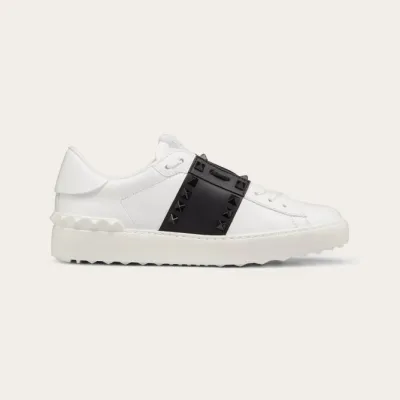 VALENTINO Women's studded calf leather sneakers in the same color
