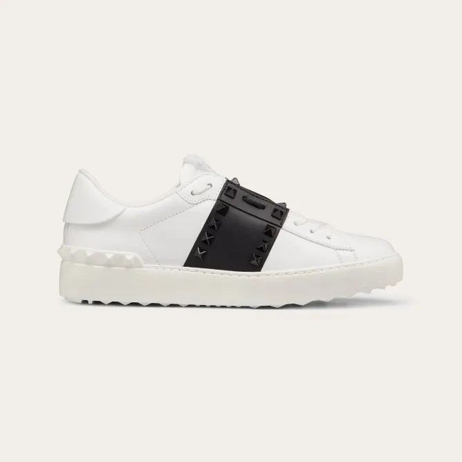 VALENTINO Women's studded calf leather sneakers in the same color