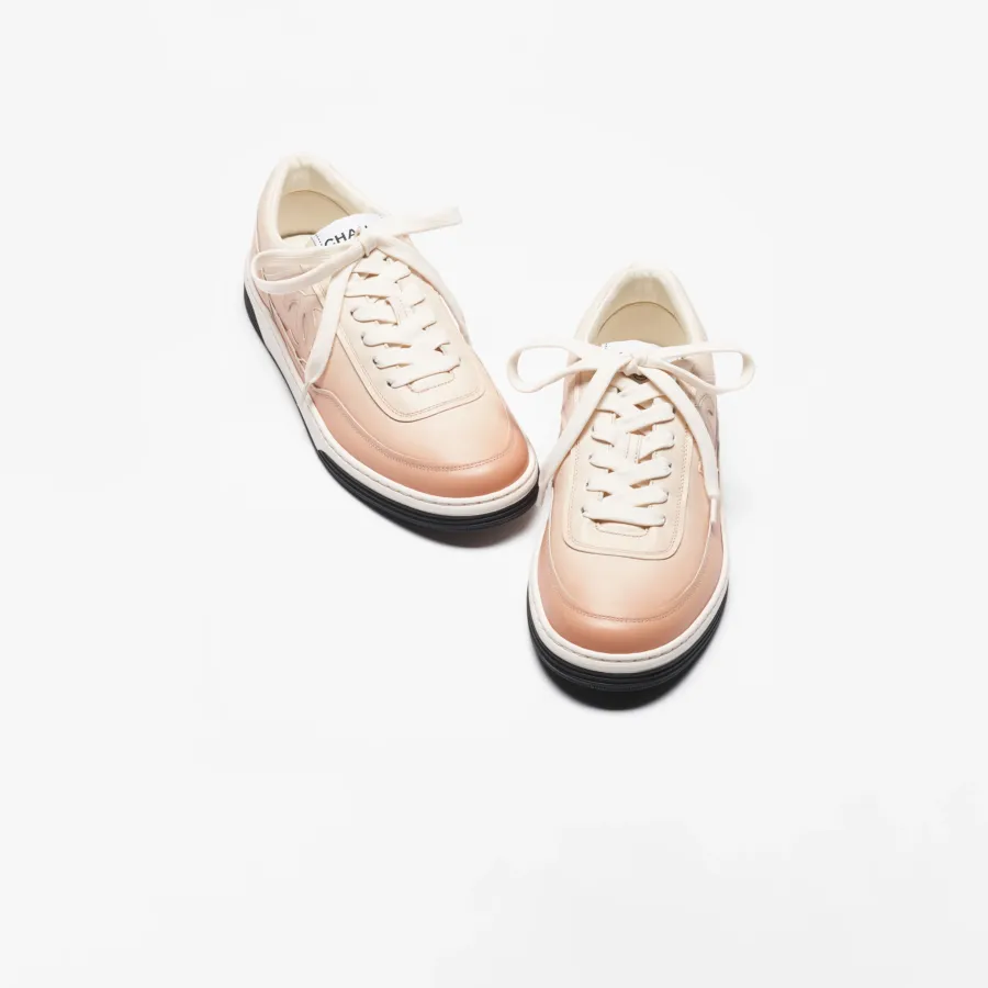 Calfskin with light orange print Chanel Sneakers