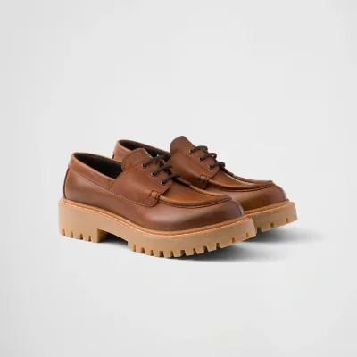 PRADA Lace-up leather loafers in cognac
