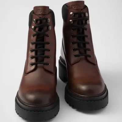 PRADA Dark brown leather and recycled nylon ankle boots