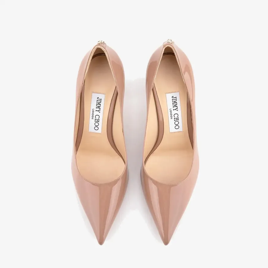 JIMMY CHOO JC badge embellishes pink high heels