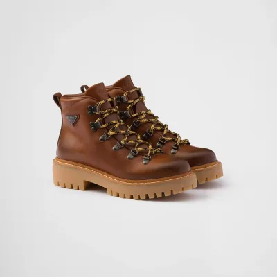 PRADA Lace-up ankle boots in cognac leather