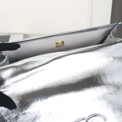 Chanel Silver / Gold / Black  patent leather Backpacks